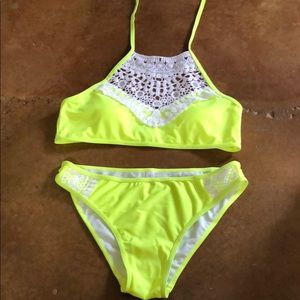 Fluorescent yellow bathing suit with lace details